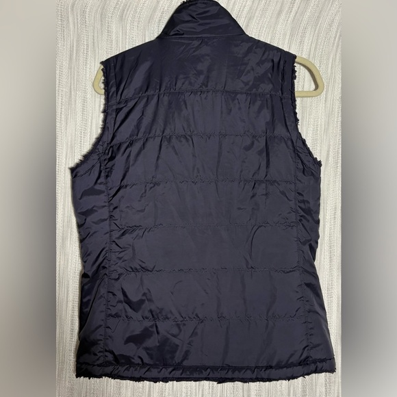 The North Face dark purple reversible vest with mossbud lining and pink Accents - Picture 2 of 5